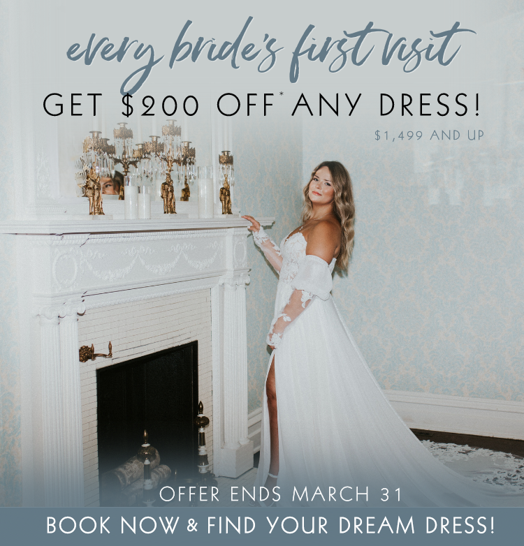 Every bride gets $200 off her wedding dress through March 31, 2024. Bride wearing flowing aline wedding dress in vintage mansion